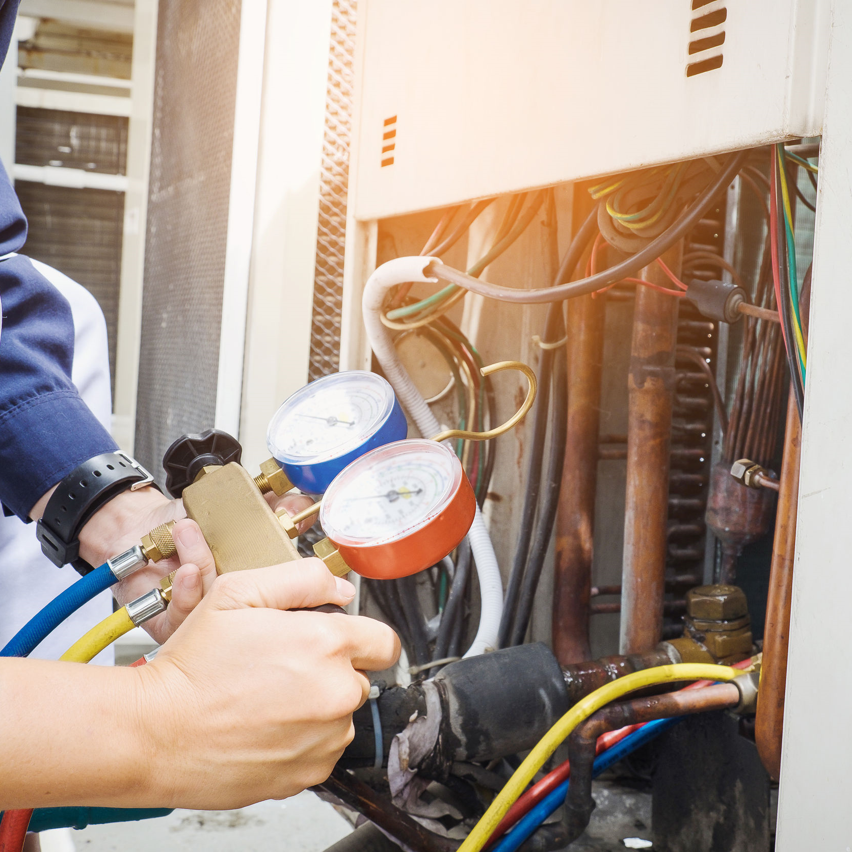 Technician checking an air conditioner